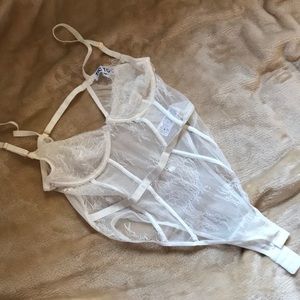 white lingerie one-piece bodysuit